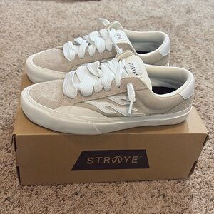 Tan Straye shoes with big laces.